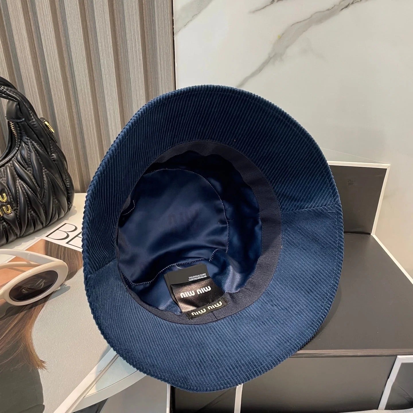 MM BUCKET IN NAVY BLUE VELVET WITH LOGO